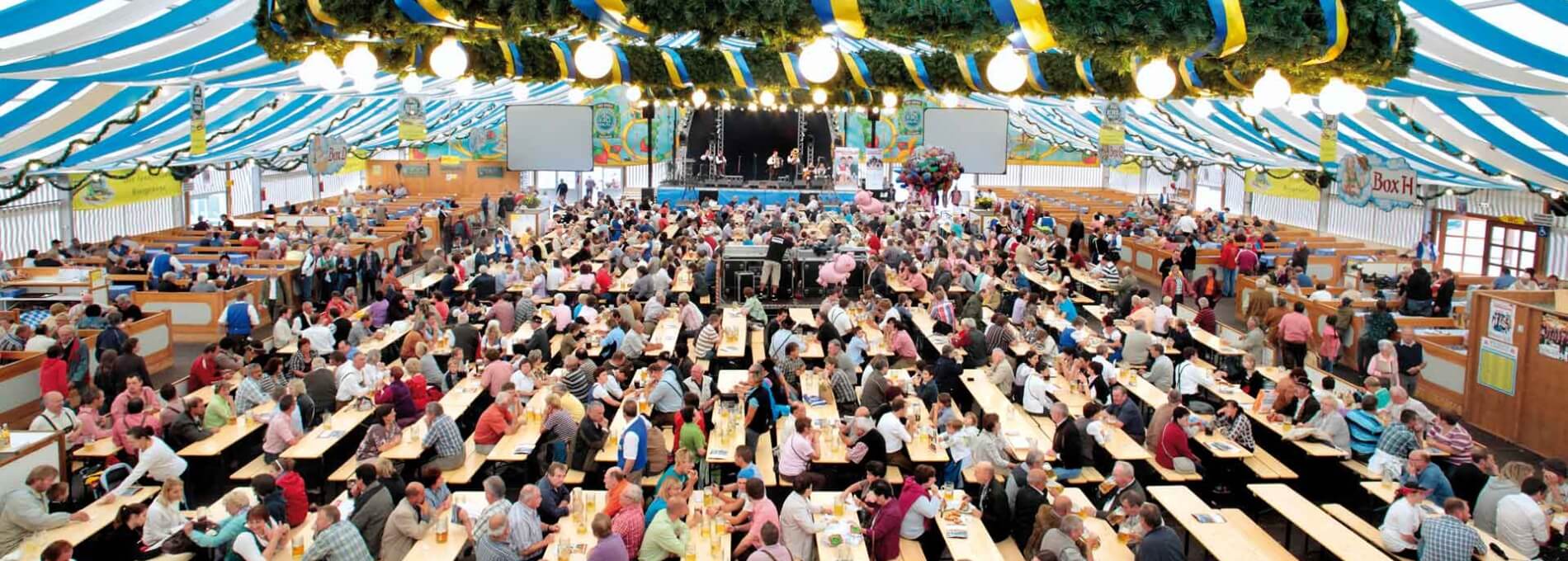 The classic beer garden table sets in natural color at Oktoberfest