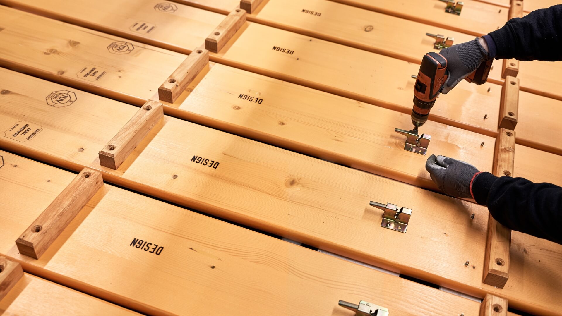 The folding furniture lock is attached to the underside of the beer tent set.