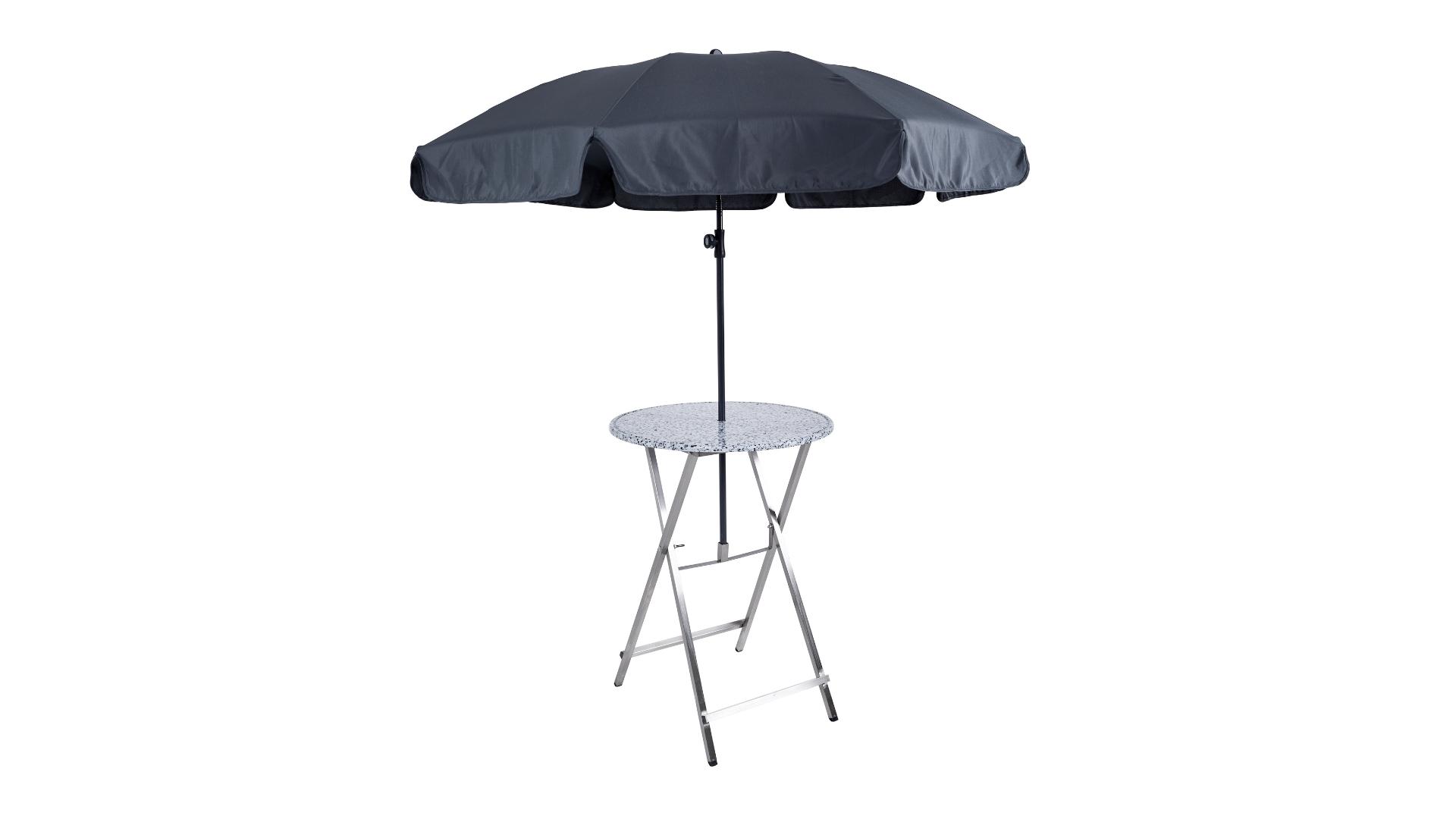 Der Stehtisch Unkaputtbar hat einen schwarzen Schirm im Schirmloch befestigt.