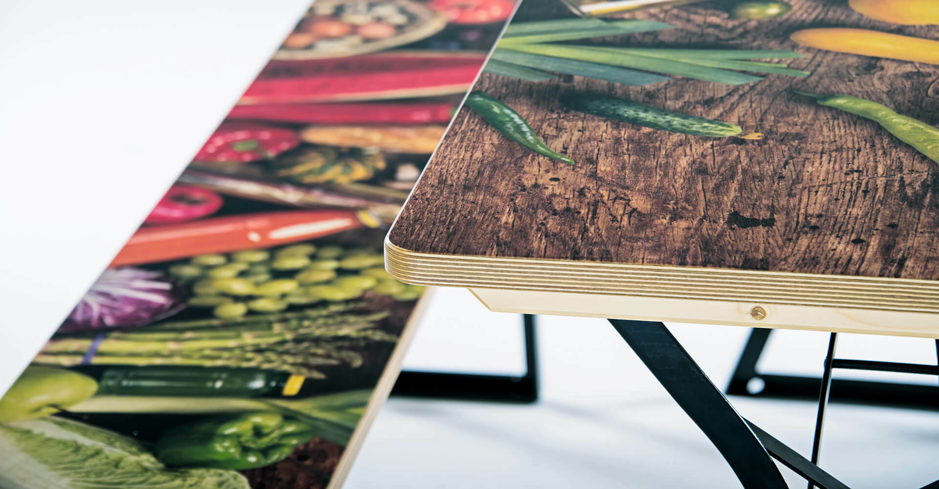 The beer table from RUKU1952 was fully printed with food in the digital printing process; the print in the background is printed in the same way as the beer bench in wood look.
