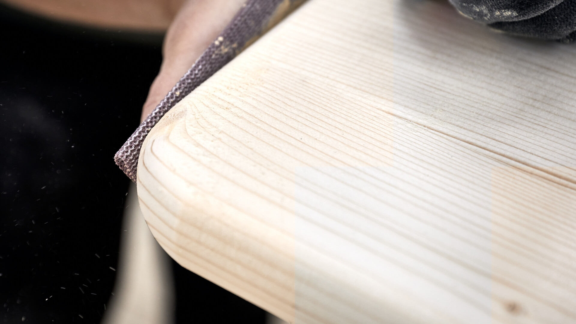 The edges of the beer tent set are sanded down.