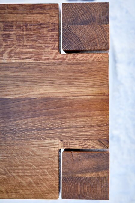 The legs of the beer bench from the Lago design set, photographed from above.